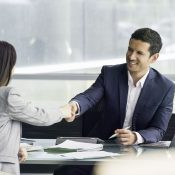 divoced lady Businessman shaking hands with client